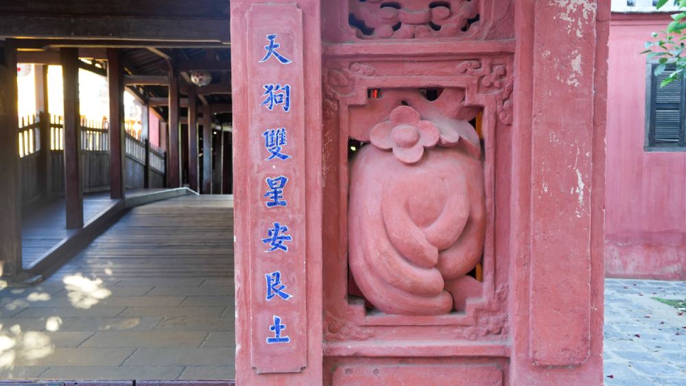 Chinese inscriptions carved on the Japanese Covered Bridge in Hoi An